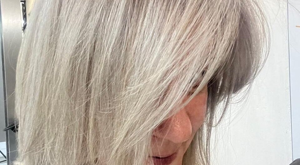 Beautiful silver hairstyle at L and B International, Sandton, Gauteng, ZA, showcasing expert salon services.