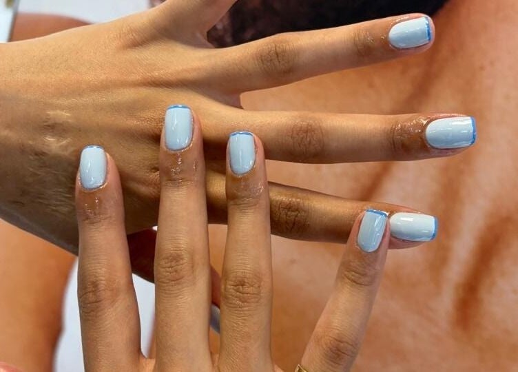 Close-up of stylish blue manicured nails at L and B International, Sandton, Gauteng, ZA.