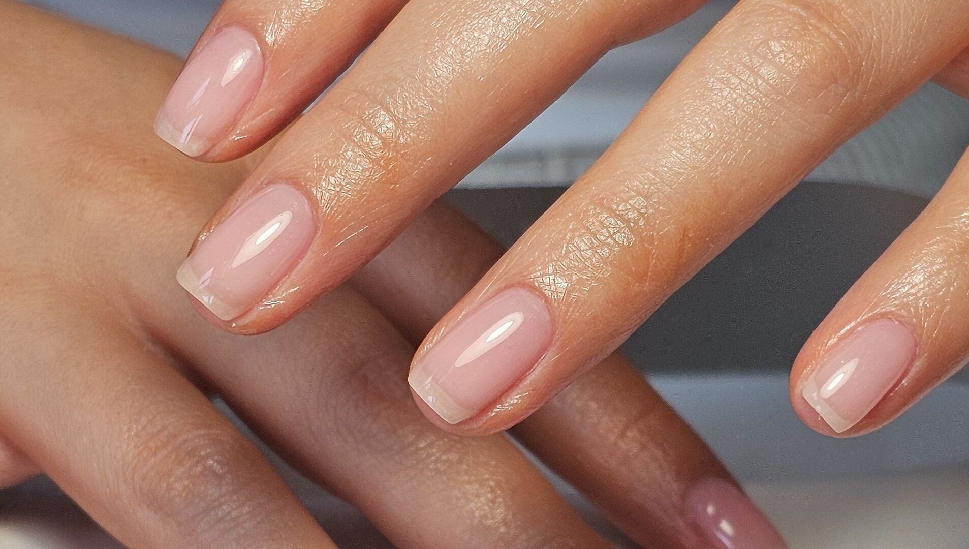 Elegant glossy nails at Nails by Alissia in Bournemouth, England, GB, showcase expert nail artistry.