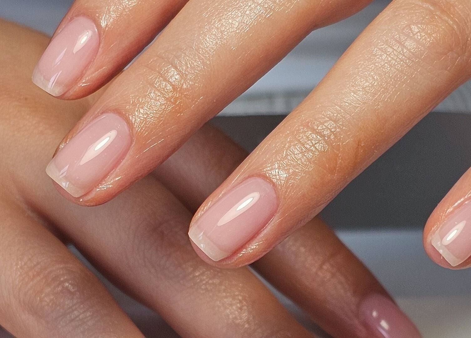 Elegant glossy nails at Nails by Alissia in Bournemouth, England, GB, showcase expert nail artistry.