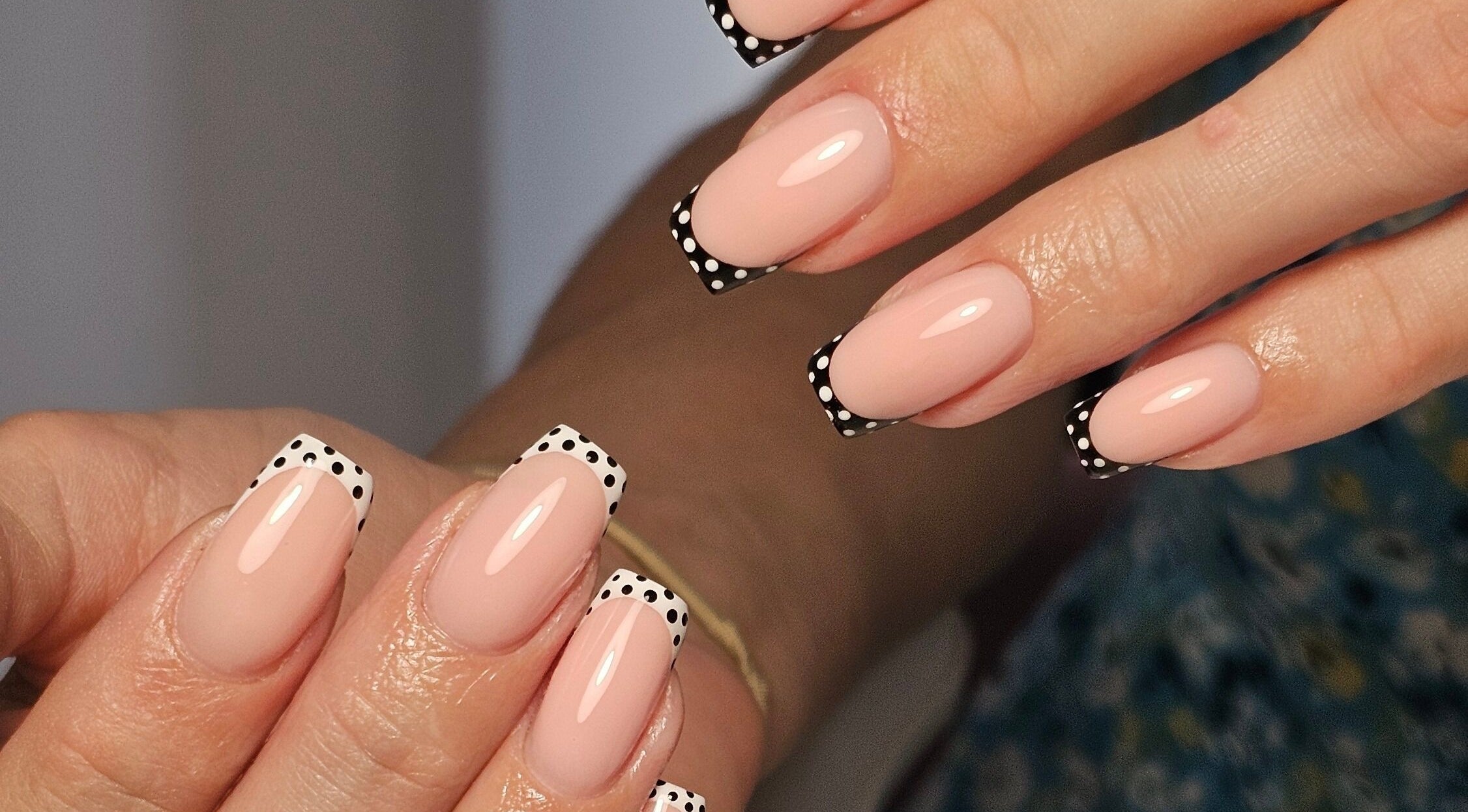 Chic polka dot manicure at Nails by Alissia, Bournemouth, England, GB. Perfect fusion of style and elegance.