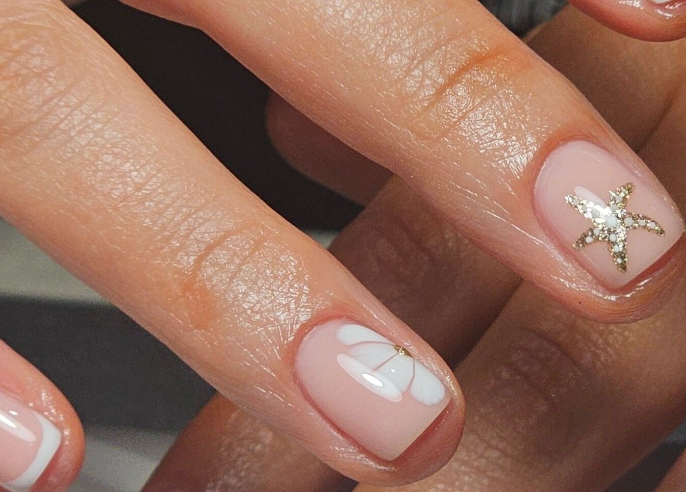Elegant star nail design at Nails by Alissia, Bournemouth, England, GB, showcasing delicate artistry.