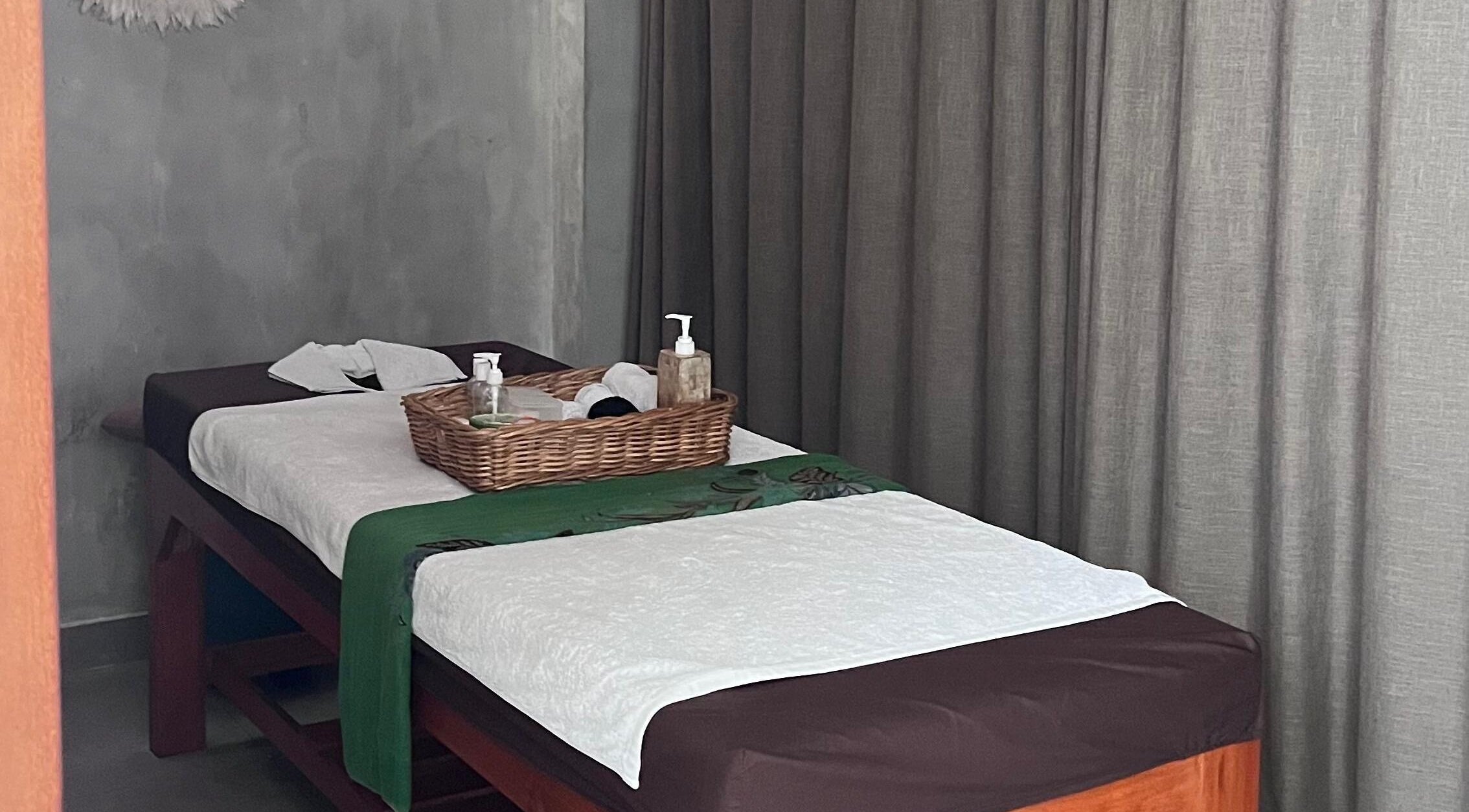 Relaxing massage table setup at Adore Nails & Massage, Bali, Bali, ID with soothing decor.