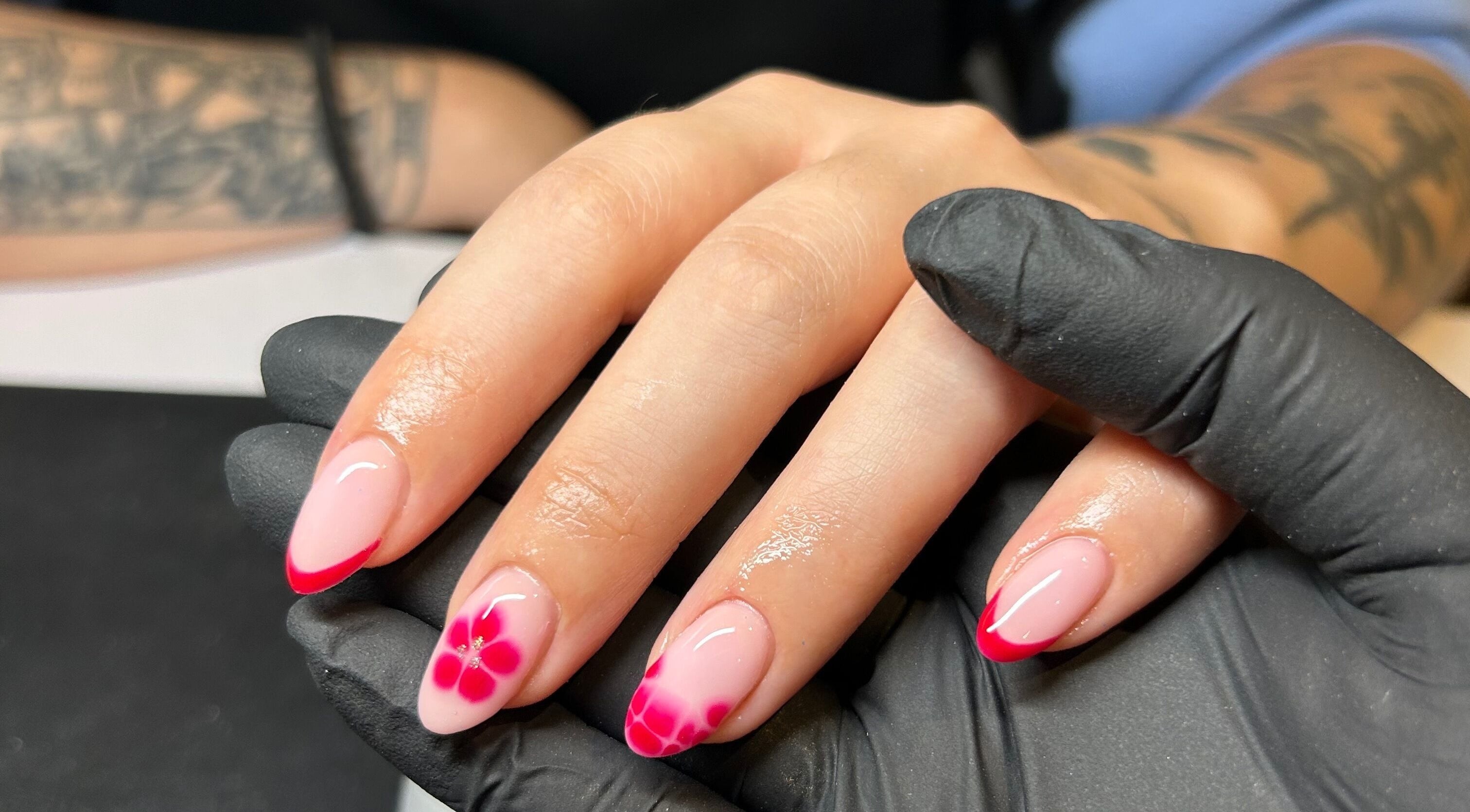 Elegant floral nail art by Brook Olyvia at Radiance Aesthetics, Portsmouth, England, GB.