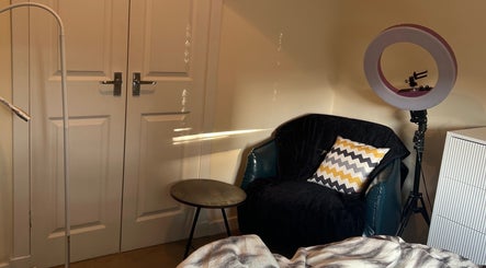 Cozy seating area at Paulina Kozyra Eyelash&Eyebrow, Loanhead, Scotland, GB.