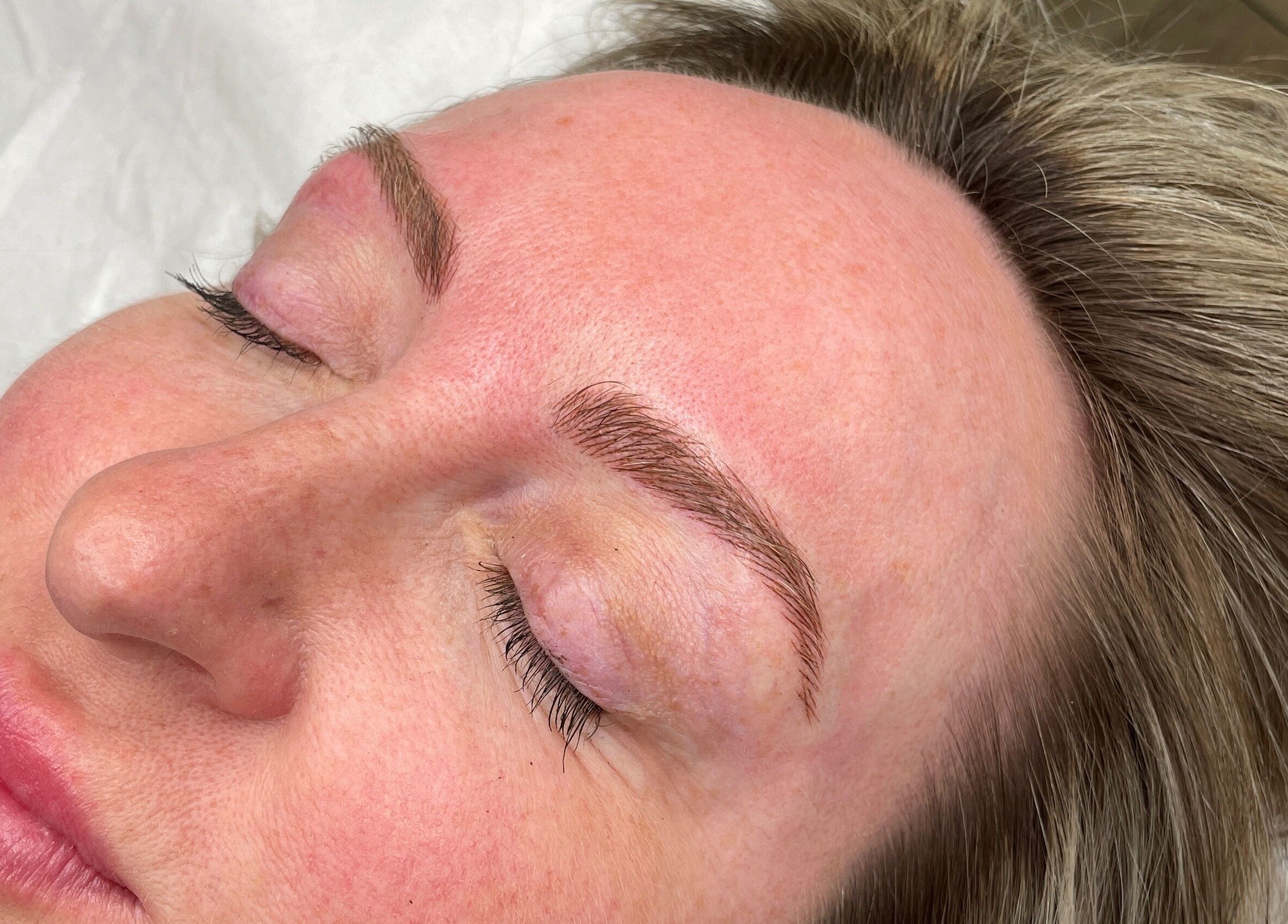 Relaxed client with natural brow enhancement at Angela Conroy @ The Serenity rooms Emsworth, Emsworth, England, GB.