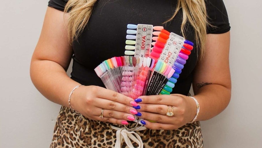 Colorful nail palette at Nails by Lexxi, Siloam Springs, Arkansas, US, showcasing vibrant manicure options.