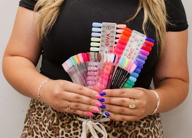 Colorful nail palette at Nails by Lexxi, Siloam Springs, Arkansas, US, showcasing vibrant manicure options.