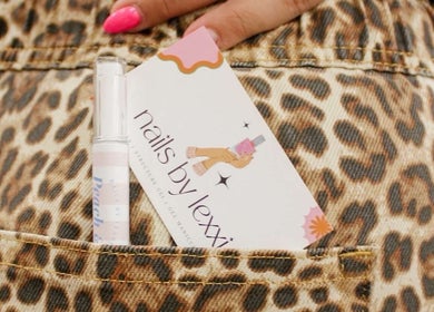 Nails by Lexxi card in leopard print pocket, Siloam Springs, Arkansas, US.