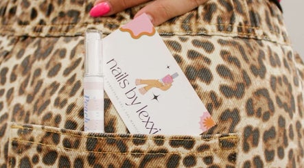 Nails by Lexxi card in leopard print pocket, Siloam Springs, Arkansas, US.