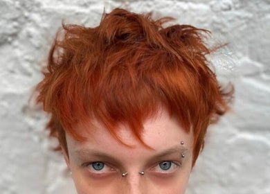 Close-up of vibrant red hair styled at Jordan Alexander @ Bathgate, Bathgate, Scotland, GB.