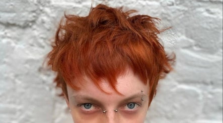 Close-up of vibrant red hair styled at Jordan Alexander @ Bathgate, Bathgate, Scotland, GB.