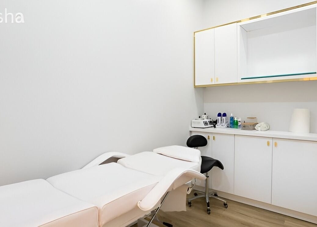 Sleek treatment room at Clear Skin Medi Spa, Brampton, Ontario, CA, showcasing modern white decor.