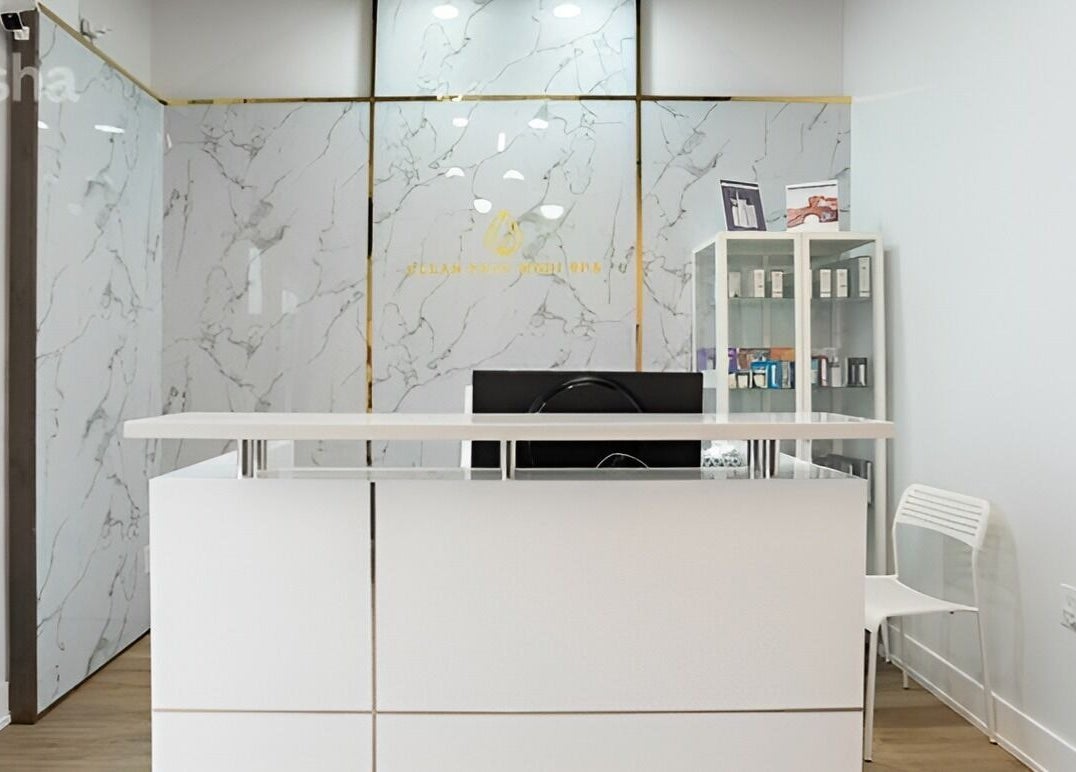 Modern reception area of Clear Skin Medi Spa in Brampton, Ontario, CA with elegant marble accents.