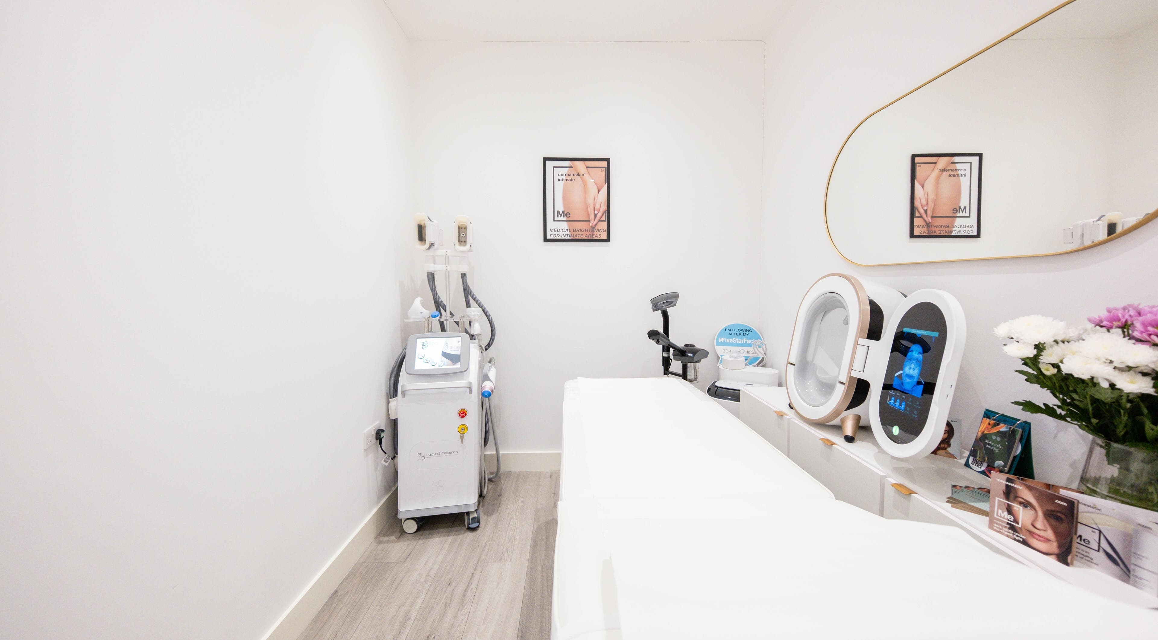 Treatment room at Oxa Beauty in London, England, GB with modern equipment and minimalist decor.
