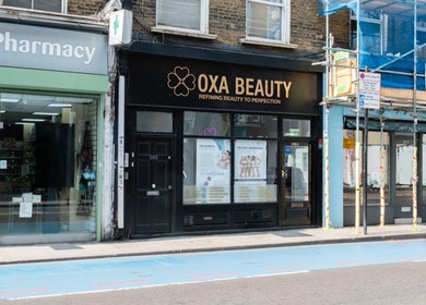 Exterior view of Oxa Beauty in London, England, GB showcasing modern beauty services in a welcoming setting.