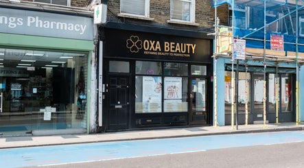 Exterior view of Oxa Beauty in London, England, GB showcasing modern beauty services in a welcoming setting.