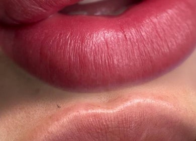 Close-up of vibrant pink lips, showcasing expert makeup at Antidote Beauty Space, Sydney, New South Wales, AU.
