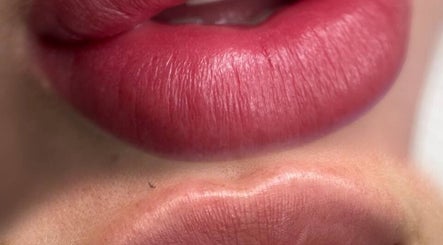Close-up of vibrant pink lips, showcasing expert makeup at Antidote Beauty Space, Sydney, New South Wales, AU.