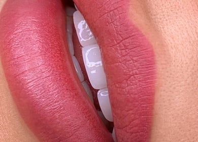 Close-up of pink lips at Antidote Beauty Space in Sydney, New South Wales, AU showcasing lipstick texture.