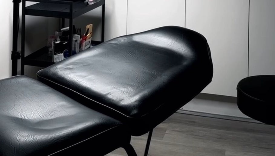 Comfortable black treatment chair at Antidote Beauty Space - Caringbah, Caringbah, New South Wales, AU.
