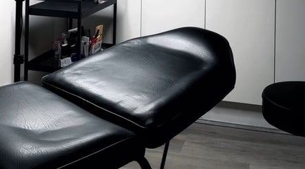 Comfortable black treatment chair at Antidote Beauty Space - Caringbah, Caringbah, New South Wales, AU.