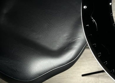 Luxurious black leather chair at Antidote Beauty Space - Caringbah, New South Wales, AU.