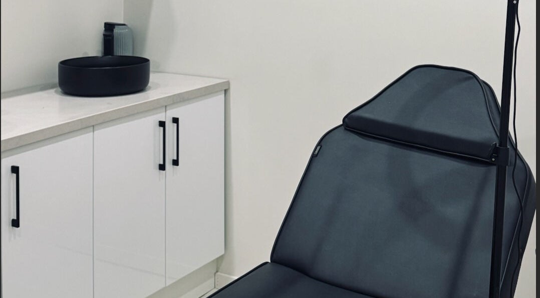 Treatment room at Antidote Beauty Space, Campsie, New South Wales, AU with sleek design and relaxation chair.