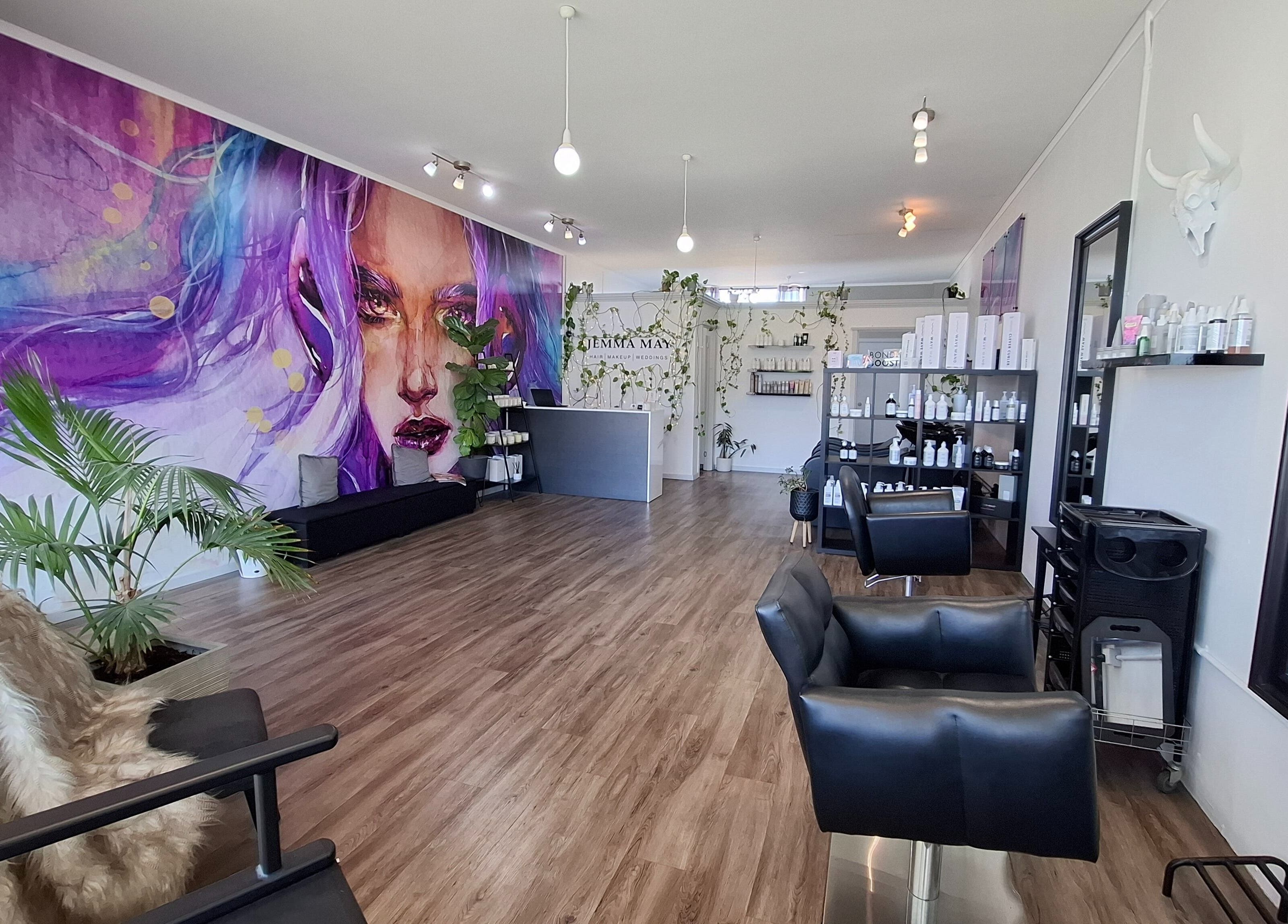Jemma May salon interior featuring vibrant art and modern decor in Albany, Western Australia, AU.