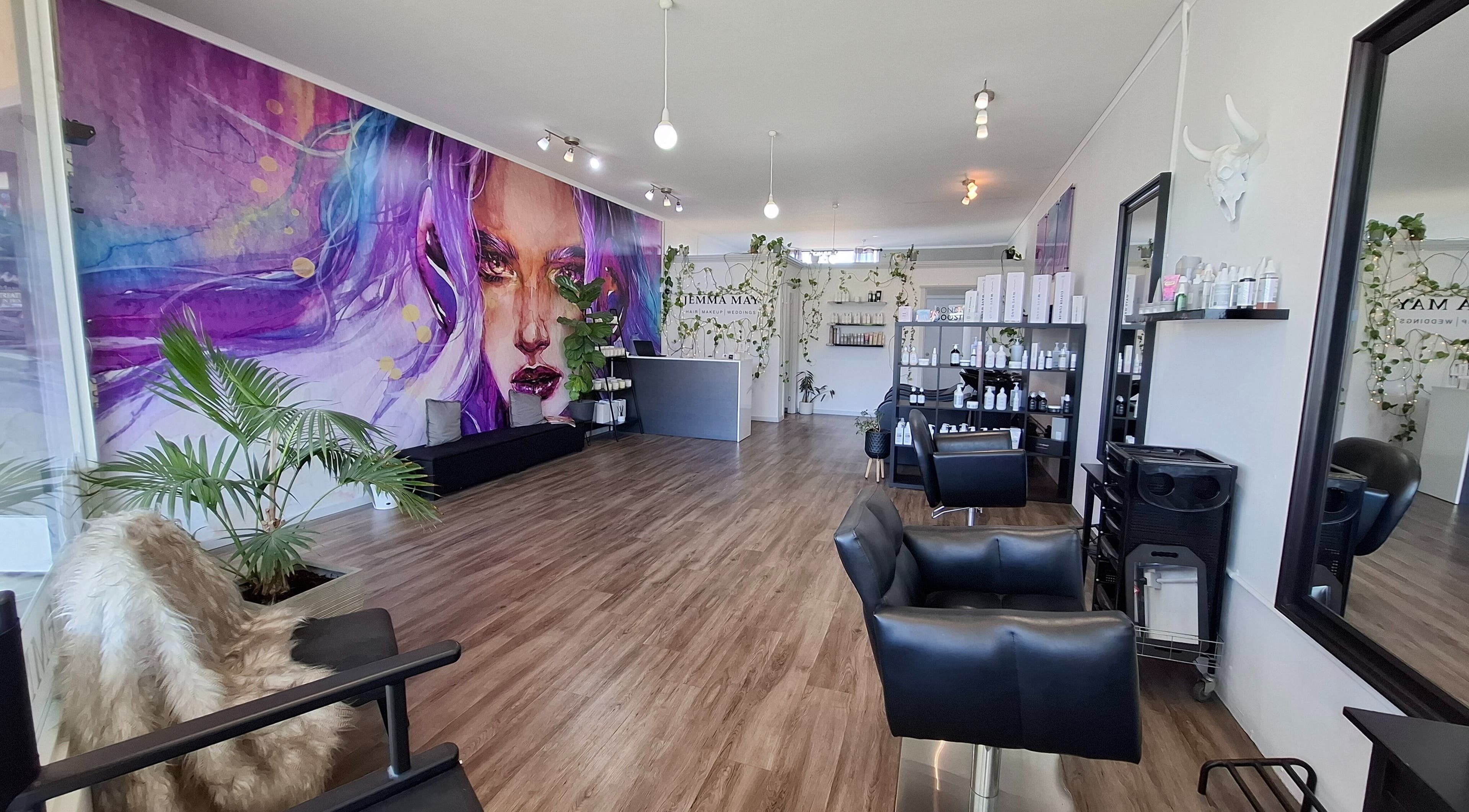 Jemma May salon interior featuring vibrant art and modern decor in Albany, Western Australia, AU.