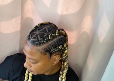 Intricate cornrow braids at Glam Styles, Princess Quarter, SX showcasing expert styling.
