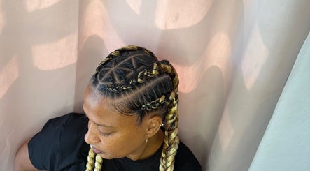 Intricate cornrow braids at Glam Styles, Princess Quarter, SX showcasing expert styling.