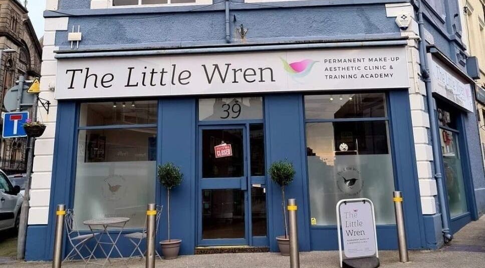 The Little Wren facade in Caernarfon, Wales, GB showcasing elegant blue and white exterior.