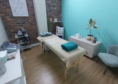 Inviting treatment room at Azura Health and Beauty, Cape Town, Western Cape, ZA, with relaxing decor and soft ambiance.