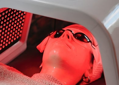 Woman experiencing LED therapy at Azura Health and Beauty, Cape Town, Western Cape, ZA.