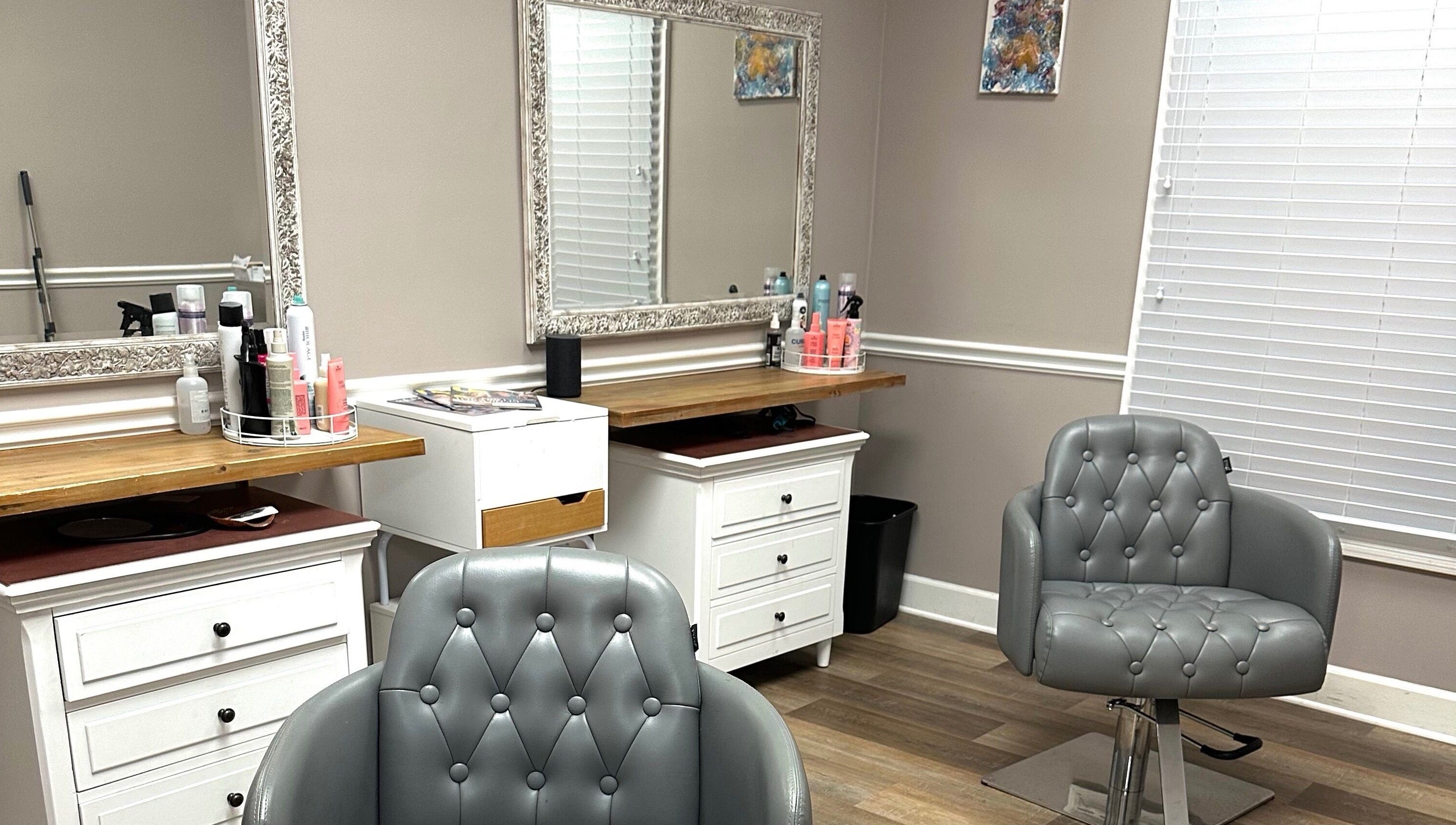 Elegant styling chair and mirror at Studio 36 Salon and Spa, Mobile, Alabama, US, creating a chic ambiance.