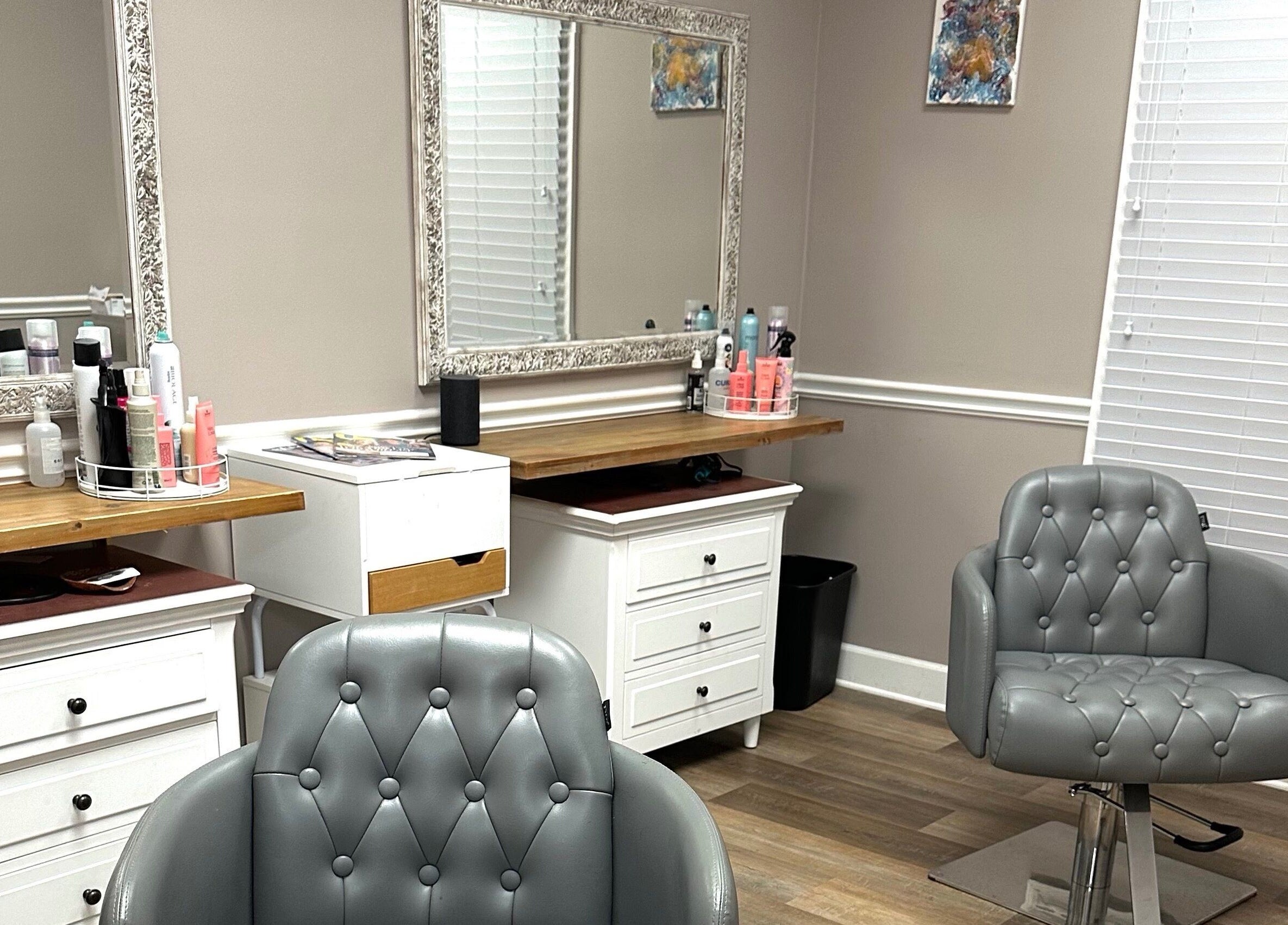 Elegant styling chair and mirror at Studio 36 Salon and Spa, Mobile, Alabama, US, creating a chic ambiance.