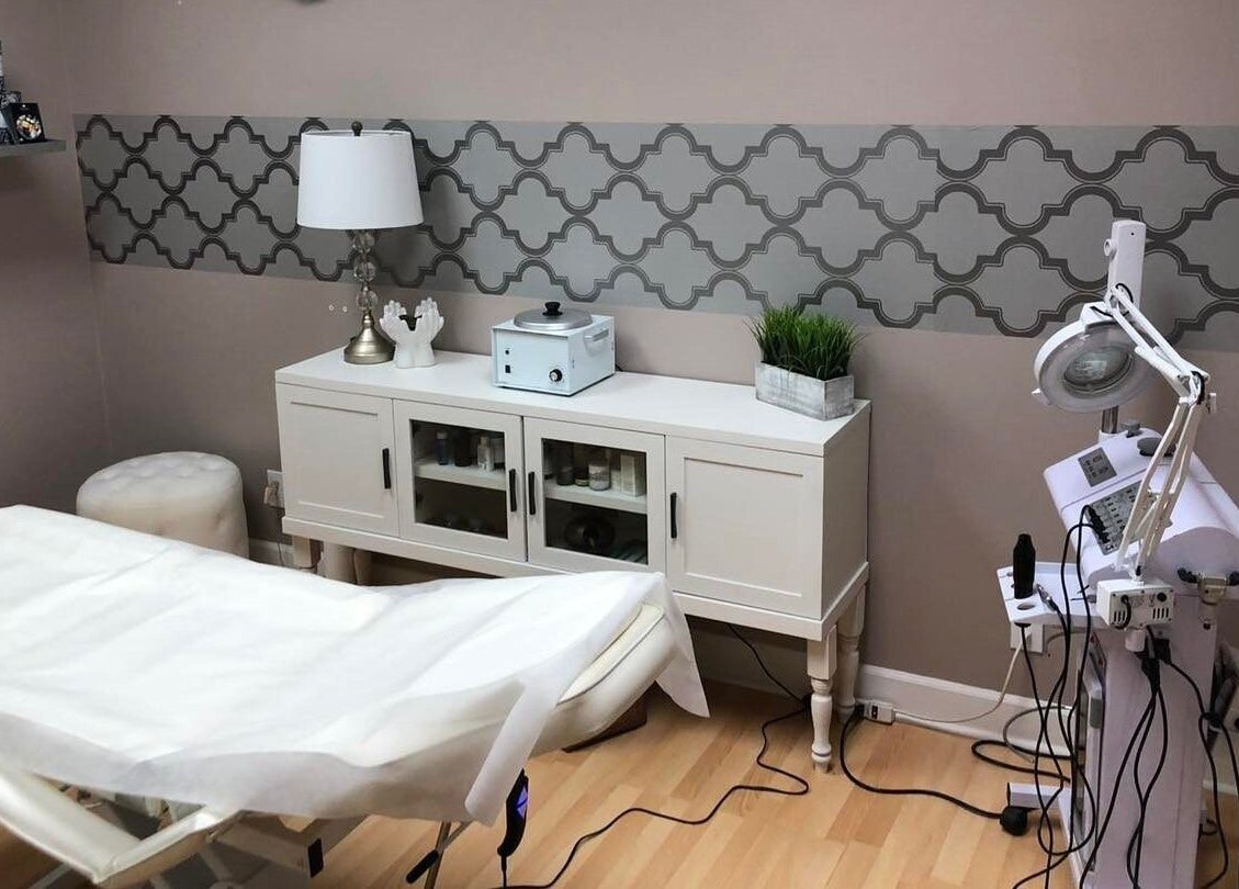 Calming treatment room at Studio 36 Salon and Spa, Mobile, Alabama, US, featuring modern spa equipment and decor.