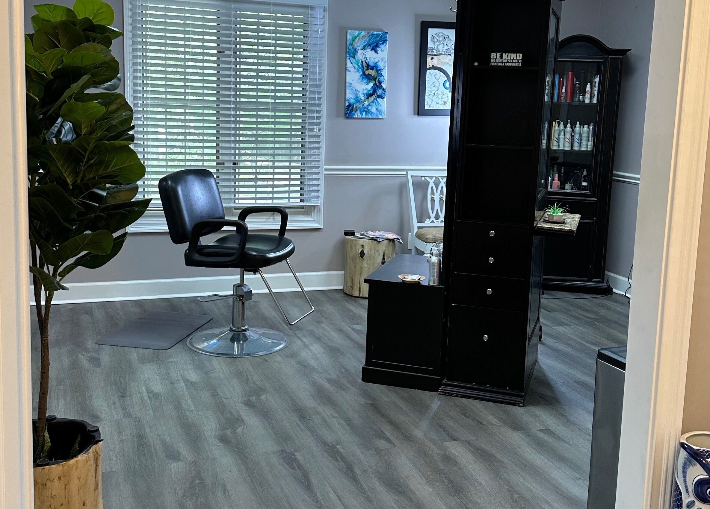 Modern salon chair and decor at Studio 36 Salon and Spa in Mobile, Alabama, US.