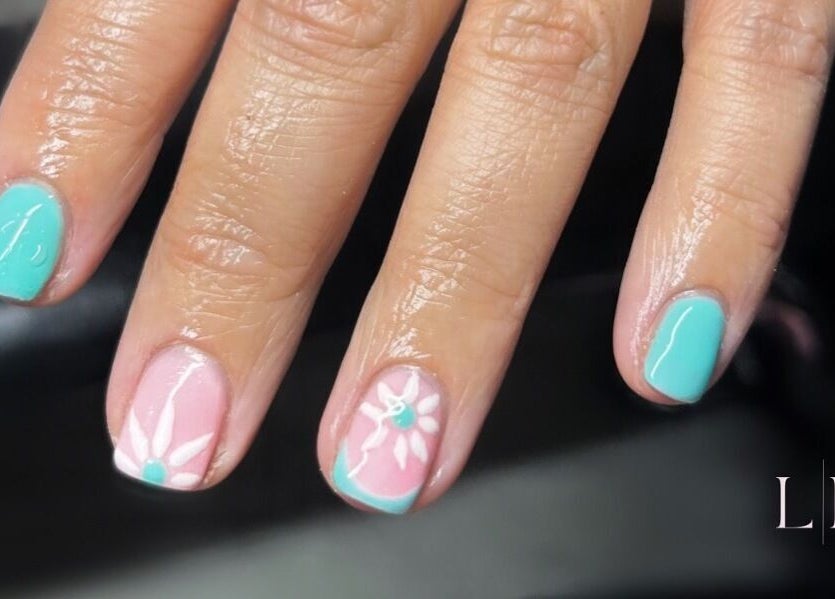 Vibrant manicure with floral accents at LuxoPolish, Castlethorpe, England, GB, showcasing expert nail artistry.