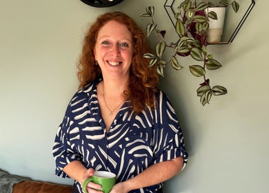 Smiling person holding a mug at Jill Cary Reiki - Rusthall, Royal Tunbridge Wells, England, GB.