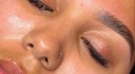 Close-up of a woman's radiant skin showcasing beauty treatment at Collective Beauty London, Coulsdon, England, GB.