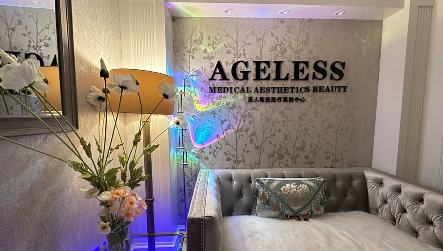 Elegant lobby of Ageless Beauty and Wellness Spa in Vancouver, British Columbia, CA with plush seating and floral decor.