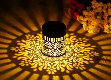 Candle casting intricate shadows at Ageless Beauty and Wellness Spa in Vancouver, British Columbia, CA.