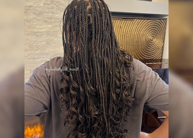 Intricate braids at MHM Braids Studio, Dublin, County Dublin, IE. Showcasing expertly styled long hair.
