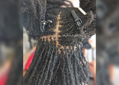 Intricate braiding at MHM Braids Studio, Dublin, County Dublin, IE.