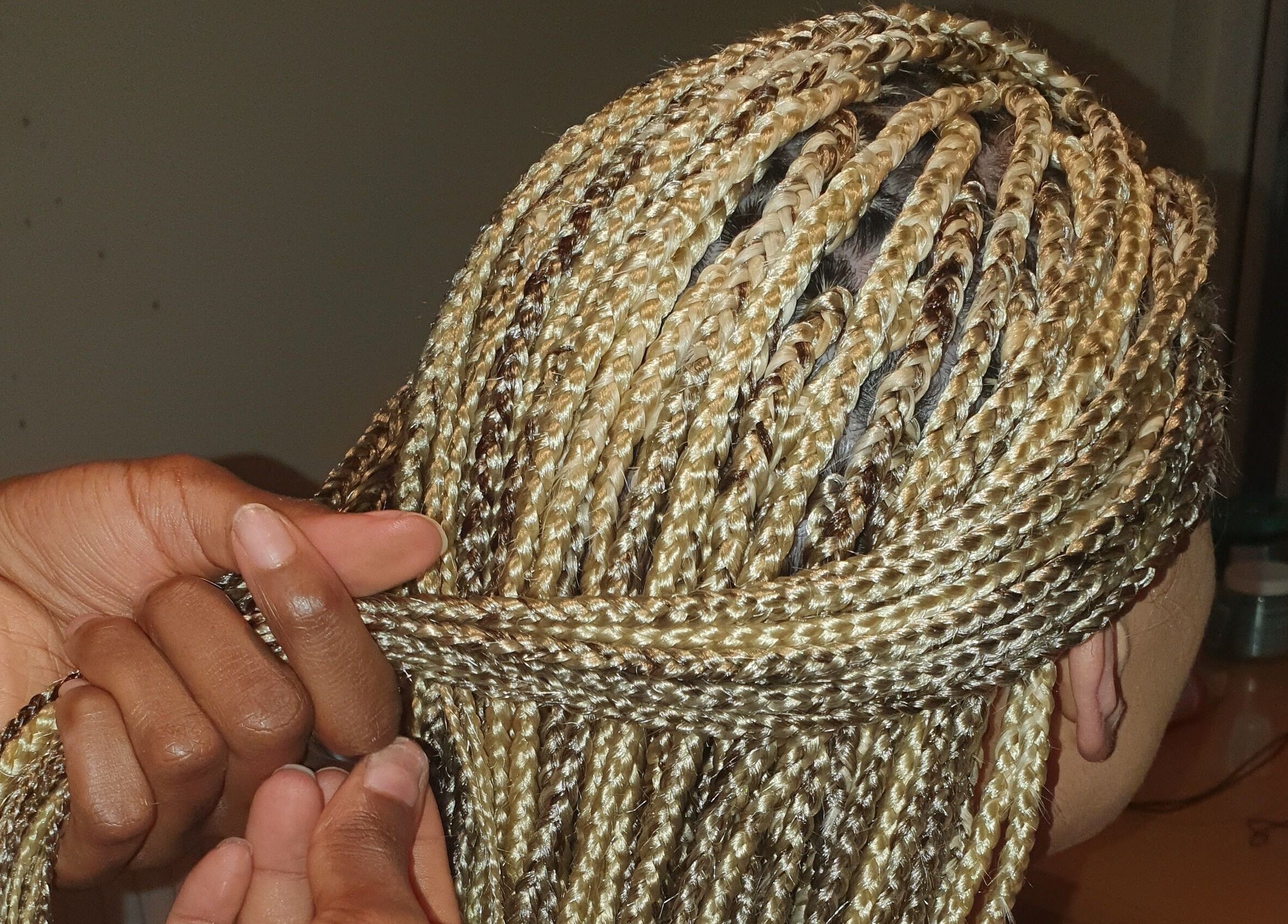 Intricate braiding at MHM Braids Studio in Dublin, County Dublin, IE showcasing skilled hair artistry.