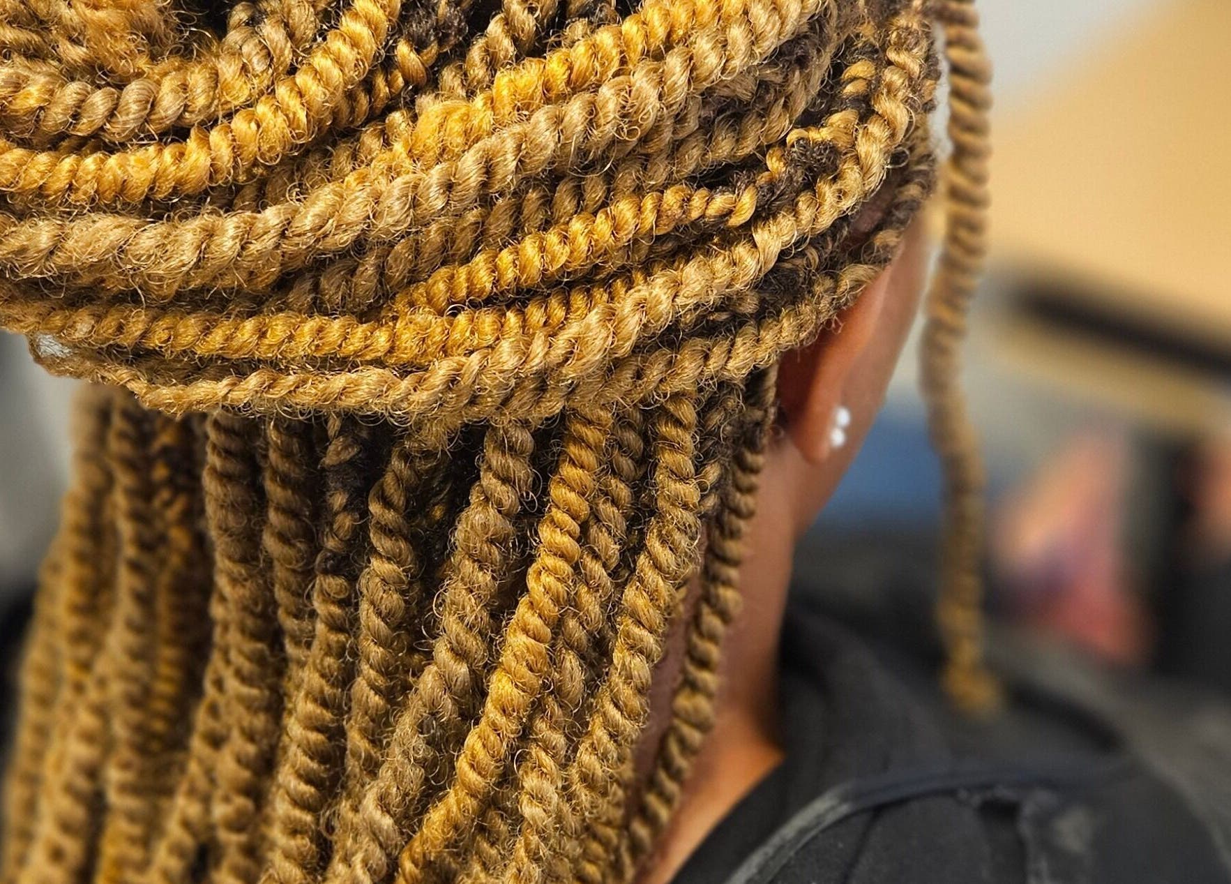 Intricate braided hairstyle at MHM Braids Studio in Dublin, County Dublin, IE showcasing expert techniques.