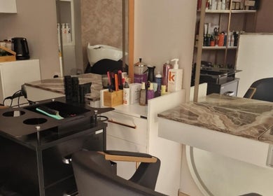 Modern salon interior at Sleek Easy Hair By Sara, showcasing styling tools and products in Ħaż-żabbar, MT.