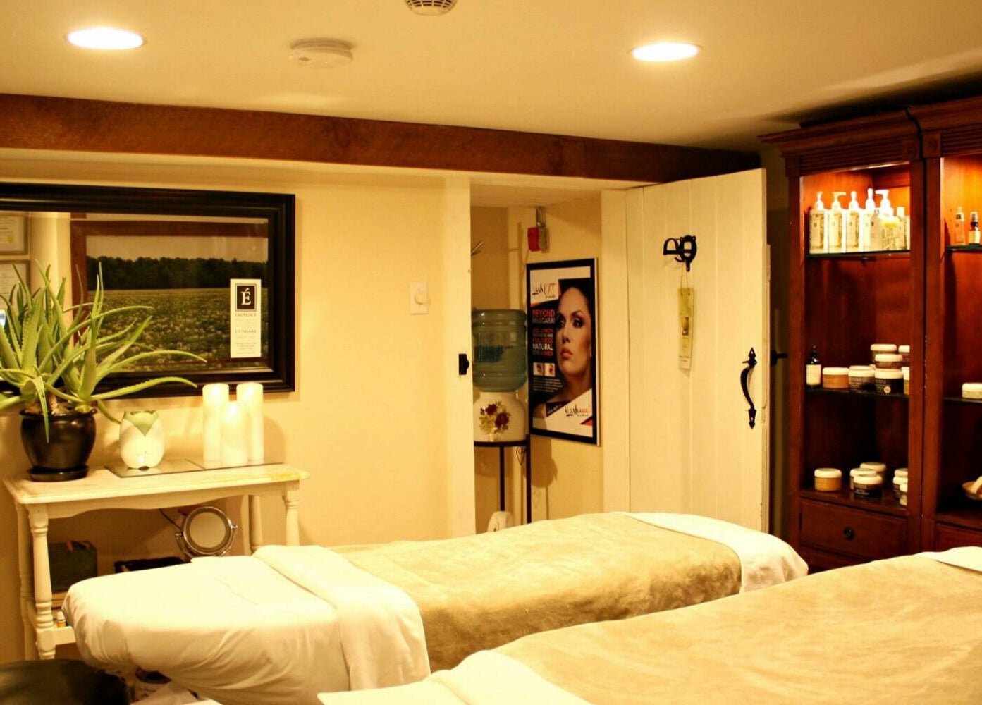 Relaxing massage room at Harvest Spa Stevenson Inn and Spa, Ontario, Ontario, CA, showcasing calm ambiance.